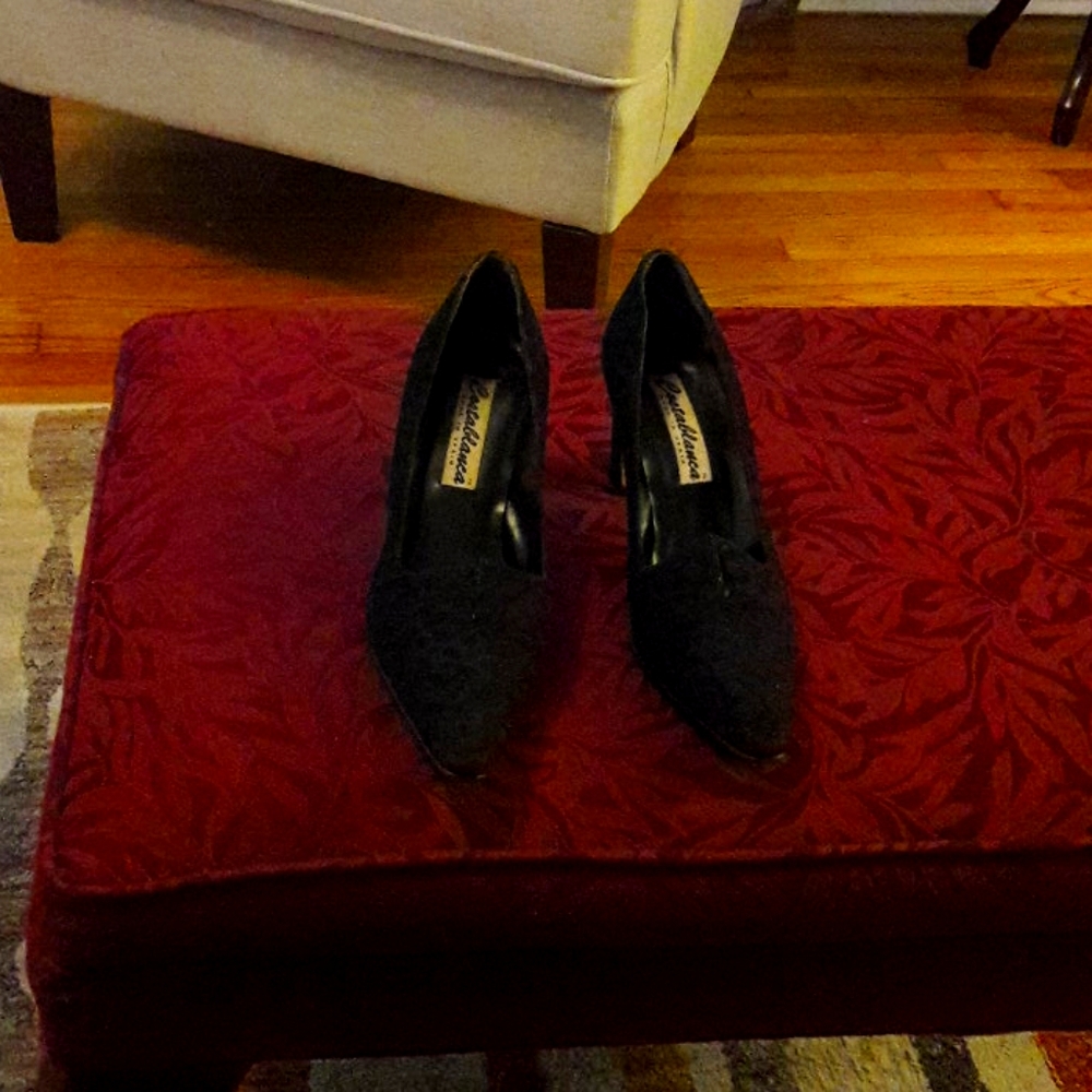 Black faux suede heels.